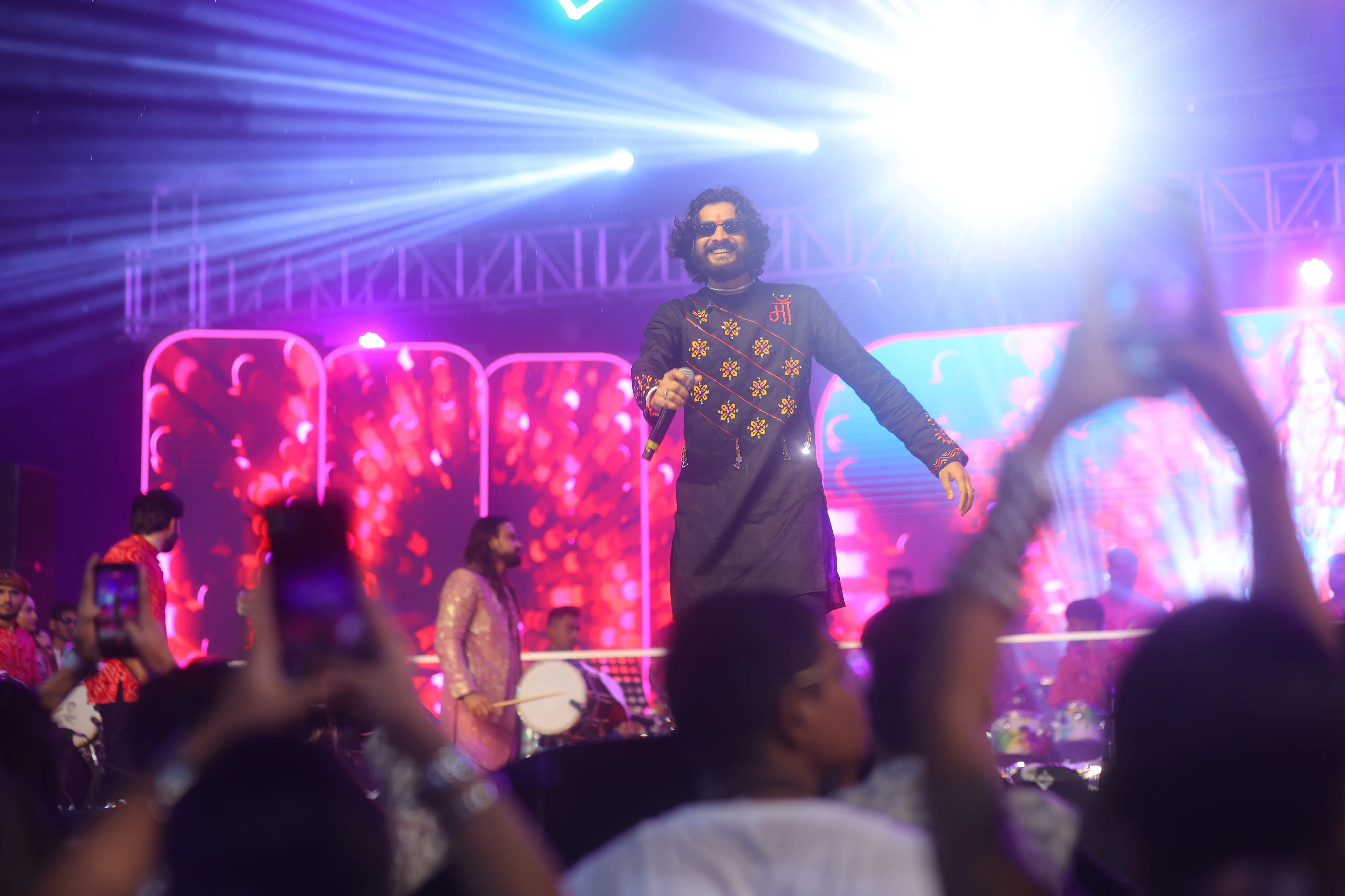 Close portrait of Nirav Barot singing