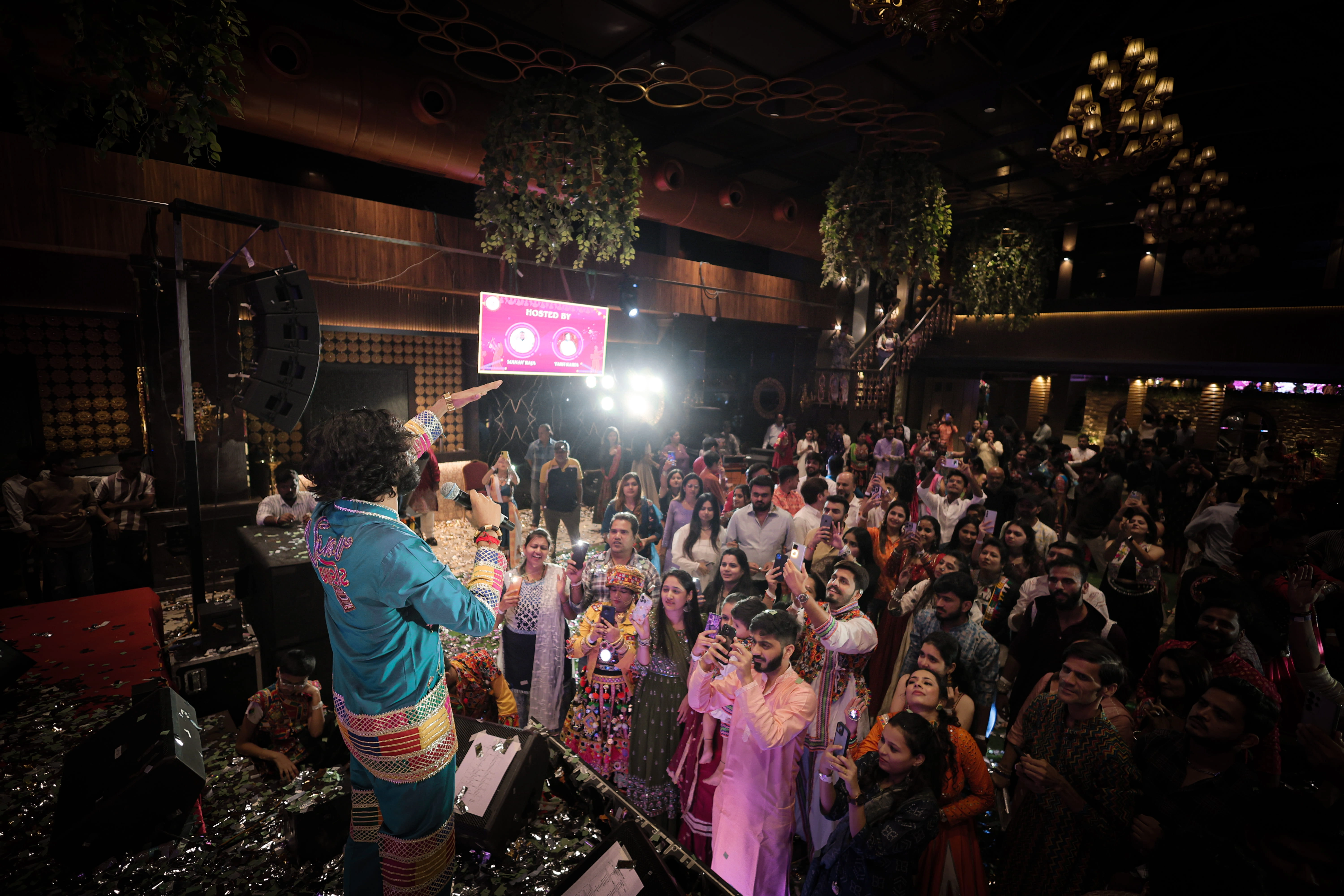 Nirav Barot greeting the audience on stage